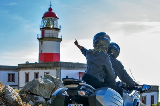 Tourists on motorbikes on the Galicia lighthouses route