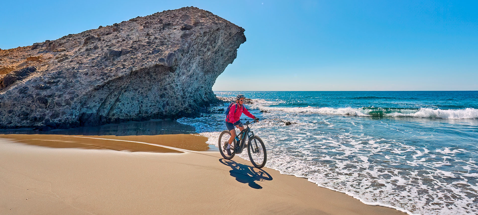 Cyclist in the Cabo de Gata-Níjar Nature Reserve, Almería Cyclist in the Cabo de Gata-Níjar Nature Reserve, Almería