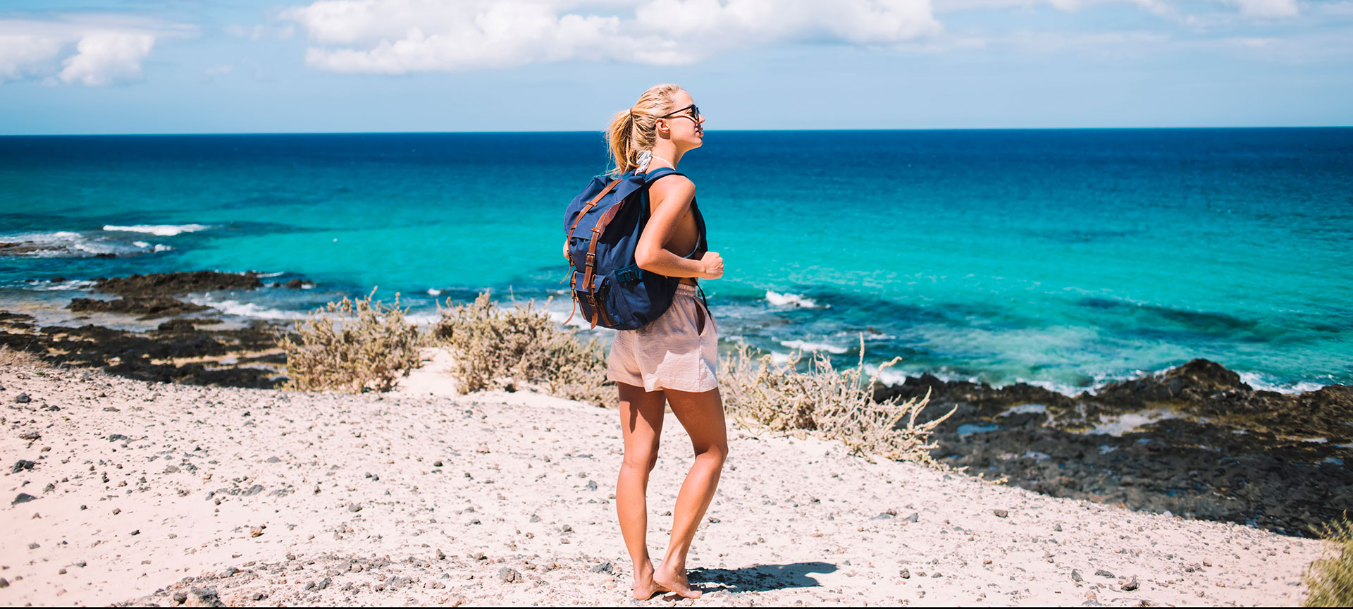 Young woman on a beach in Minorca, Balearic Islands Young woman on a beach in Minorca, Balearic Islands