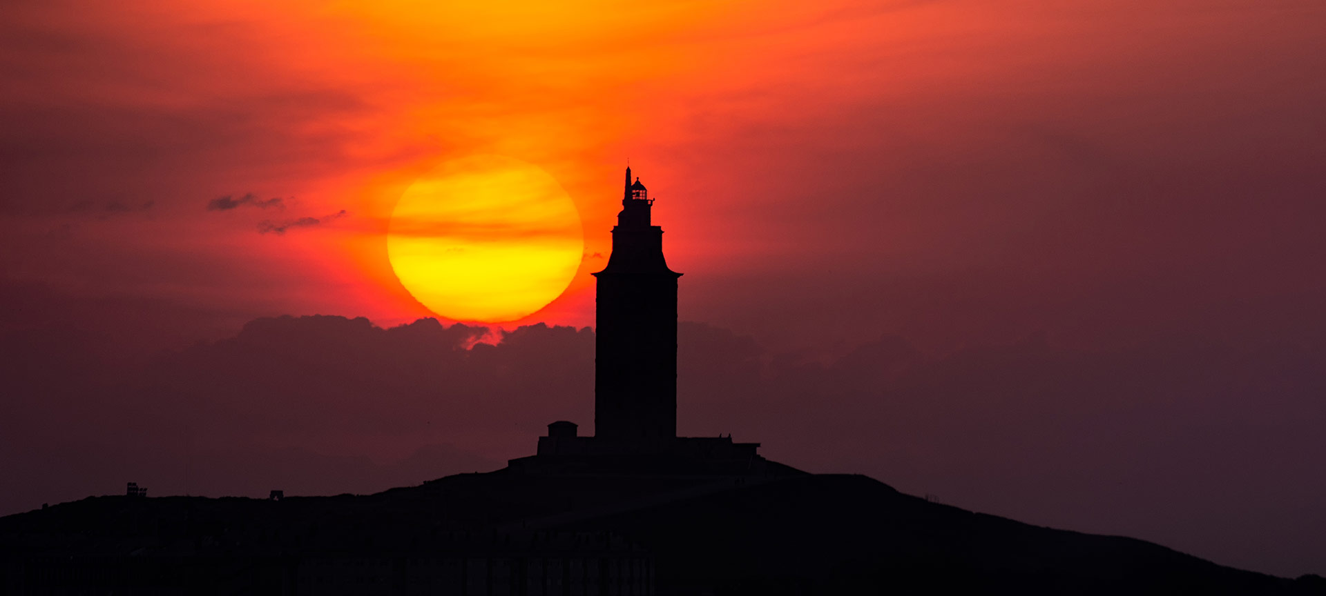 The Tower of Hercules at sunset, Galicia The Tower of Hercules at sunset, Galicia