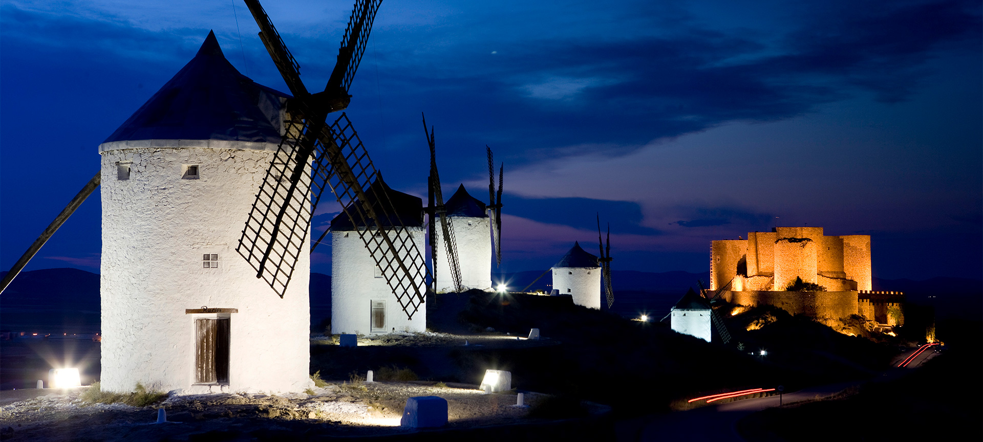 Windmills in Consuegra at sunset Windmills in Consuegra at sunset