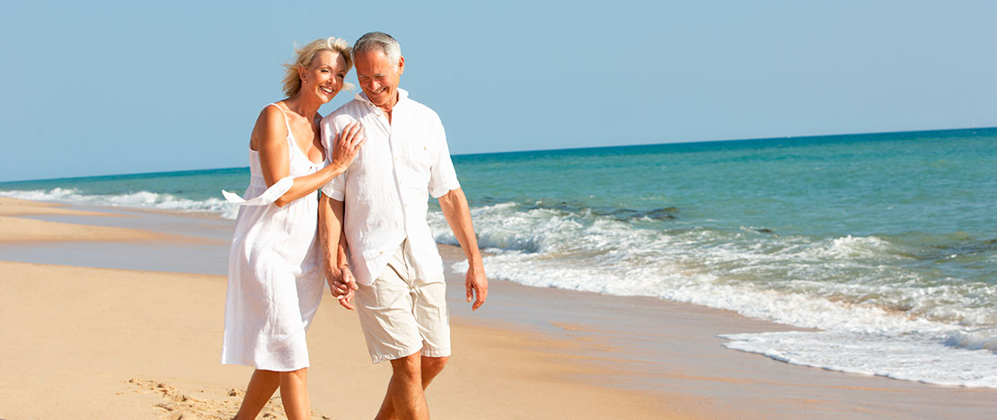 Older couple on the beach Older couple on the beach