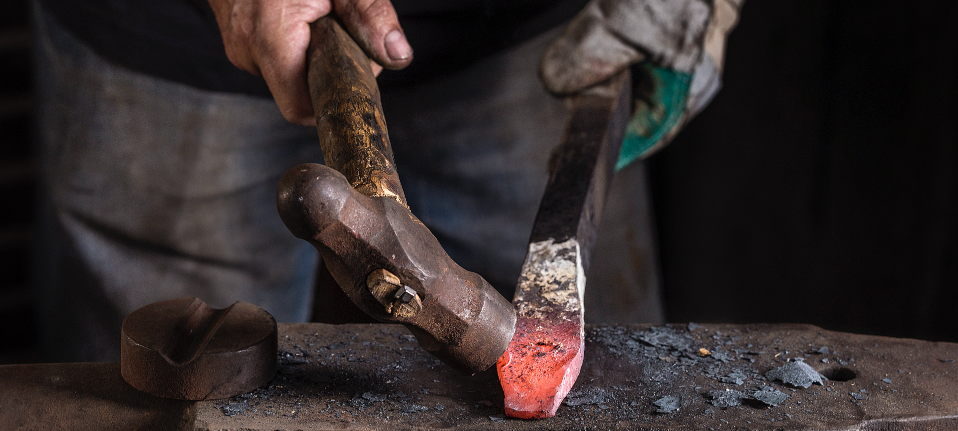 Craftsman working on a sword in a workshop in Toledo. Craftsman working on a sword in a workshop in Toledo.
