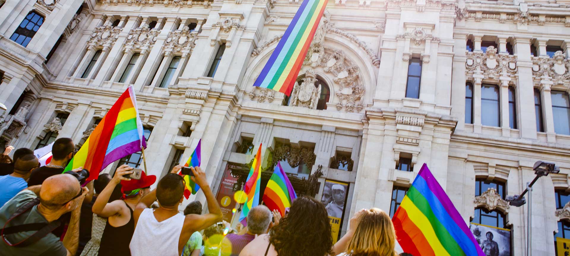 Madrid town hall with LGBTQI+ Pride flags Madrid town hall with LGBTQI+ Pride flags